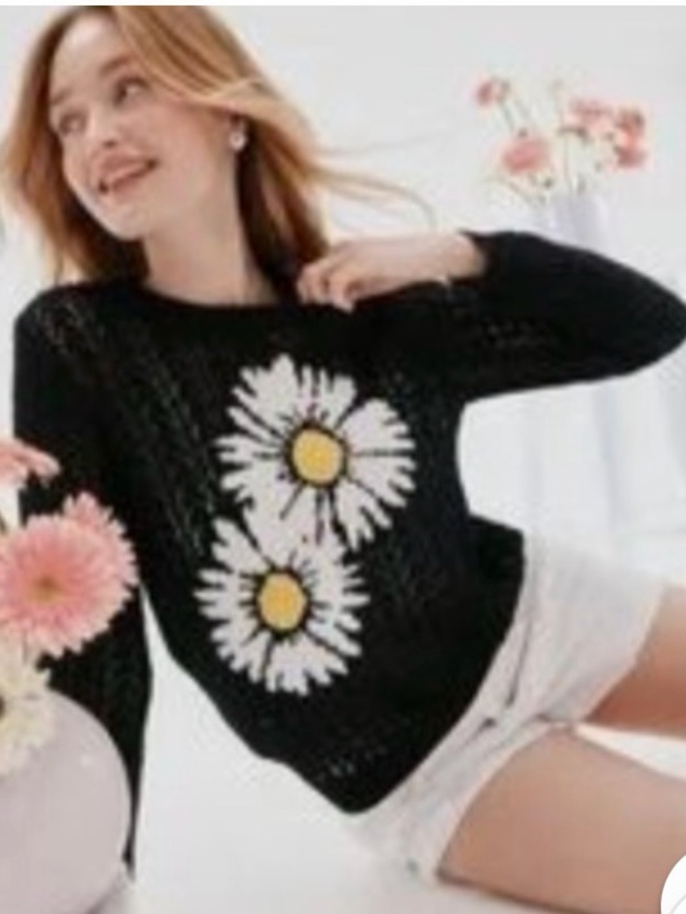 Francesca’s L black and Daisy sweater